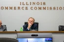 Illinois Commerce Commission Chair Doug Scott is pictured alongside commissioners Michael Carrigan (left) and Ann McCabe (right) at a November 2023 meeting in Springfield.