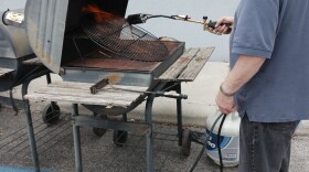 Rabbi Steven Bayar Kashering grills to purify at Congregation Agudas Achim in preparation for Sunday's 8th Annual Texas Kosher BBQ Championship!