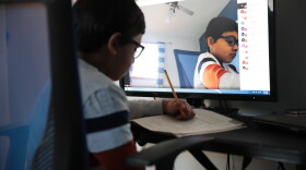 Parents are strategizing about how to teach their children at home as distance learning has become more of a norm during the pandemic. (Scott Olson/Getty Images)