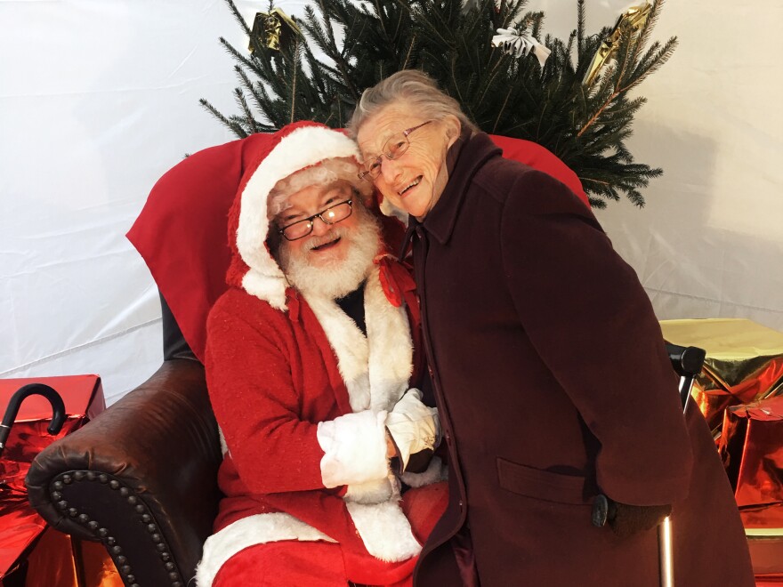 Haley and Andree Boursier, 88, pose for photos. She says she still believes in Pere Noel.