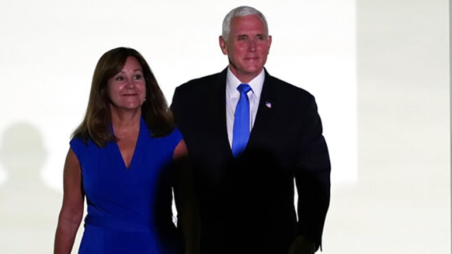 Vice President Mike Pence and second lady Karen Pence arrive to listen to first lady Melania Trump to speak during the 2020 Republican National Convention from the Rose Garden of the White House, Tuesday, Aug. 25, 2020, in Washington.