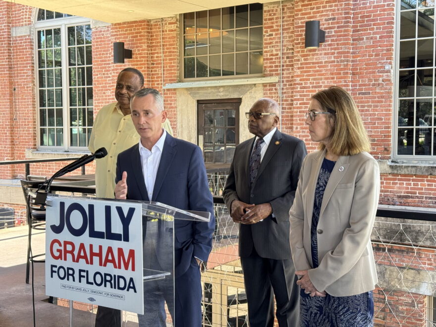 Appearing in Tallahassee Monday, October 12, 2026, Jolly and running mate Gwen Graham are flanked by U.S. Rep. James Clyburn, a South Carolina Democrat, and former Democratic U.S. Rep. Al Lawson of Tallahassee, both prominent Black political figures.