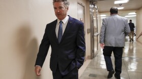 In this Wednesday, July 31, 2019, file photo, Sen. Rand Paul, R-Ky., walks to the Senate chamber at the Capitol in Washington. Paul is easing back into public activities after his recent lung surgery sidelined him for part of the August congressional break.
