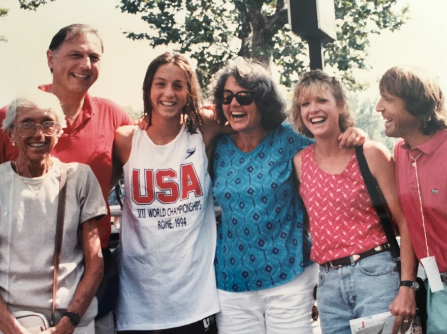 Swimmer Cristina Teuscher Fabbri (third from left) with her family and coach John Collins (right) at the 1994 World Championships in Rome.