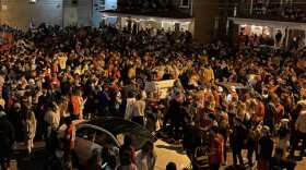 More than a thousand people gathered on Chittenden Avenue following the Spring Ohio State football game on April 18, 2021. Multiple cars were flipped.