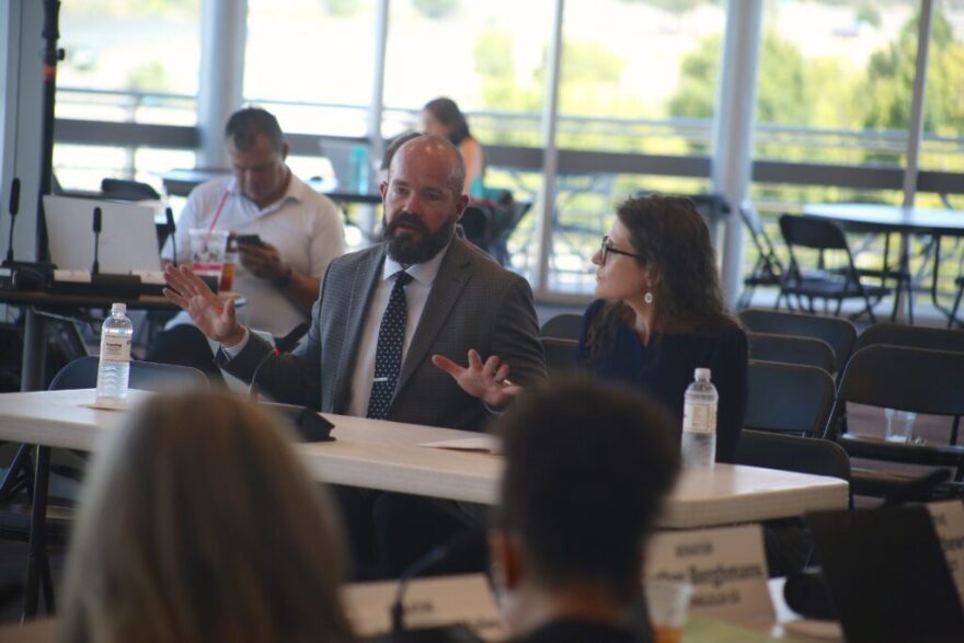 New Mexico Sixth Judicial District Judge Jarod Hofacket, left, and Second Judicial District Family Court Judge Jane Levy, right, speak about artificial intelligence use in court before the interim Courts, Corrections and Justice Committee in Albuquerque on Aug. 25, 2026.