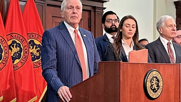 FILE - Nassau County Executive Bruce Blakeman, at podium, speaks during a news conference in Mineola, N.Y., March 6, 2024. (AP Photo/Philip Marcelo, File)
