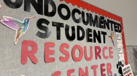 A poster hanging outside of Northern Illinois University's Undocumented Student Resource Center