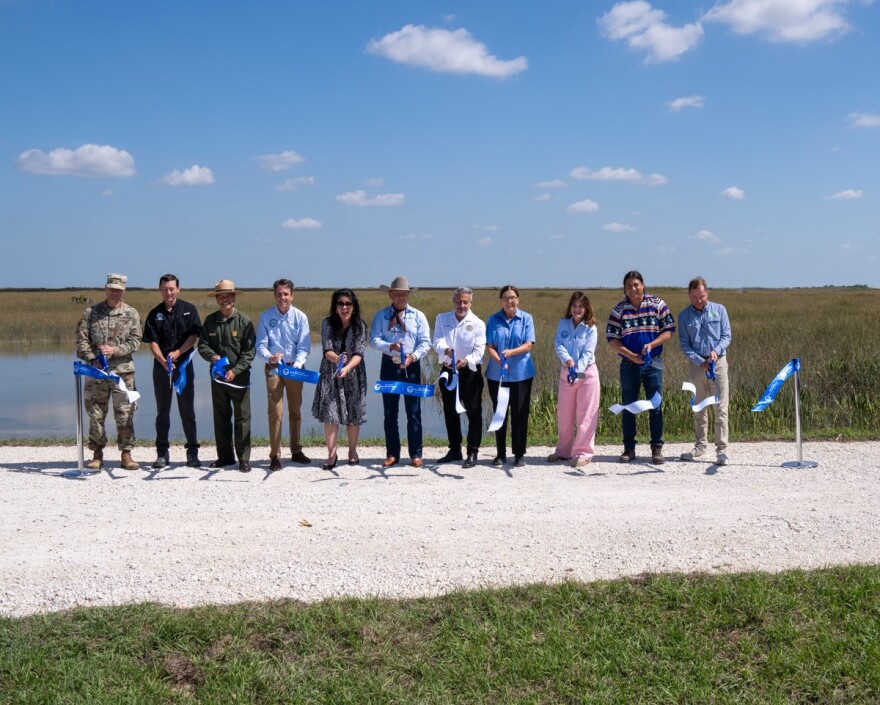 Pictured from Left to Right: Maj. Cory Bell, USACE - Jacksonville District; Deputy Secretary Adam Blalock, DEP; Superintendent Pedro Ramos, Everglades National Park; Director Drew Bartlett, SFWMD; Sen. Ana Maria Rodriguez; Board Member "Alligator Ron" Bergeron, SFWMD; Mayor Jose “Pepe” Diaz, City of Sweetwater; Board Member Charlette Roman, SFWMD; Board Member Cheryl Meads, SFWMD; Curtis Osceola, Miccosukee Tribe; Eric Eikenberg, Everglades Foundation