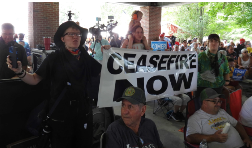 Protesters at the Fancy Farm Picnic in western Kentucky call for a cease-fire deal in the Israel-Hamas war on Saturday, August 3, 2024.