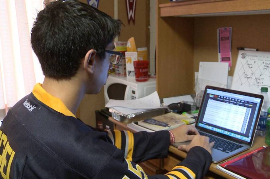 IU student Ben Segelbaum scrolls through Draft Kings, a daily fantasy sports site.