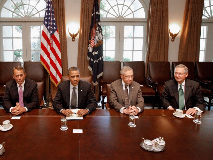 President Obama and congressional leaders work to strike a deal to raise the debt limit at the White House, July 14.