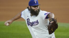 Pitcher Lance Lynn in mid-pitch on the mound in Arlington.