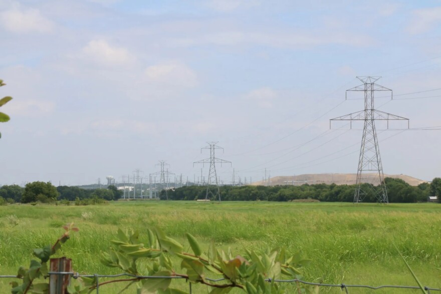 An image of a swath of land with powerlines in the background.