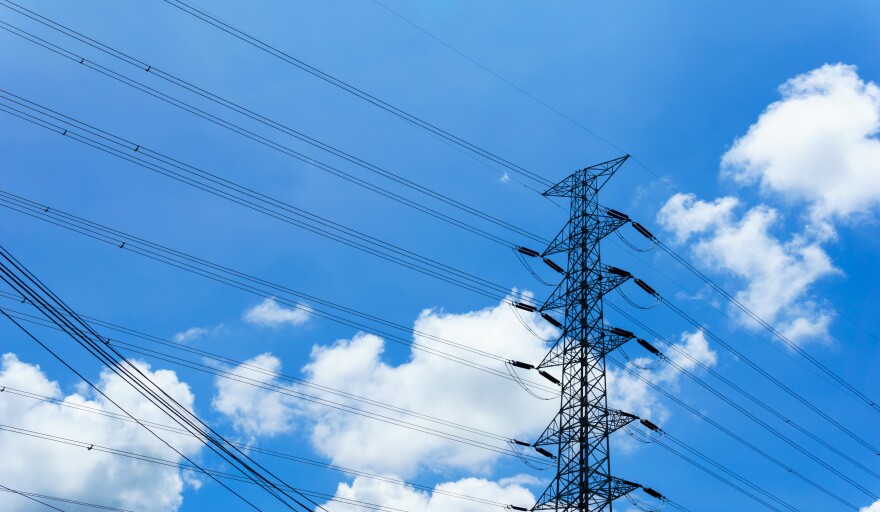 230kv high voltage electricity pylon and transmission line.