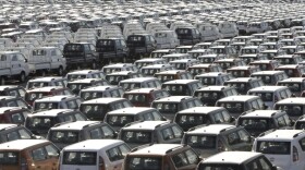 KIA Motor automobiles wait to be shipped to foreign countries at a port  in Gunsan, South Korea. Last year, South Korean automakers sold about 500,000 vehicles in the U.S., while U.S. auto companies sold 6,000 in South Korea. But a new free trade deal seeks to correct the imbalance.