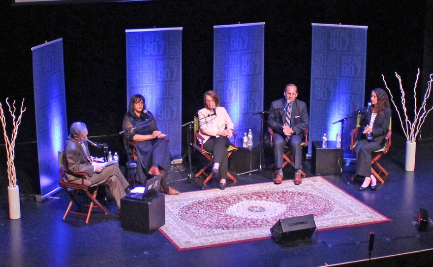 Thursday night's panel, from left: Charlotte Talks host Mike Collins, She Says podcast host Sarah Delia, CMPD Deputy Chief Katrina Graue, Lt. John Somerindyke of Fayetteville Police Department, and Brave Step director Crystal Emerick. 