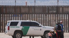 Border Patrol agents apprehend a group of migrants near downtown El Paso, Texas following the congressional border delegation visit on March 15. President Joe Biden faced mounting pressure Monday from Republicans over his handling of a surge in migrants -- including thousands of unaccompanied children -- arriving at the US-Mexican border. Republican Congressman Kevin McCarthy of California, who leads his party in the House of Representatives, told reporters last week the "crisis at the border is spiraling out of control." (JUSTIN HAMEL/AFP via Getty Images)