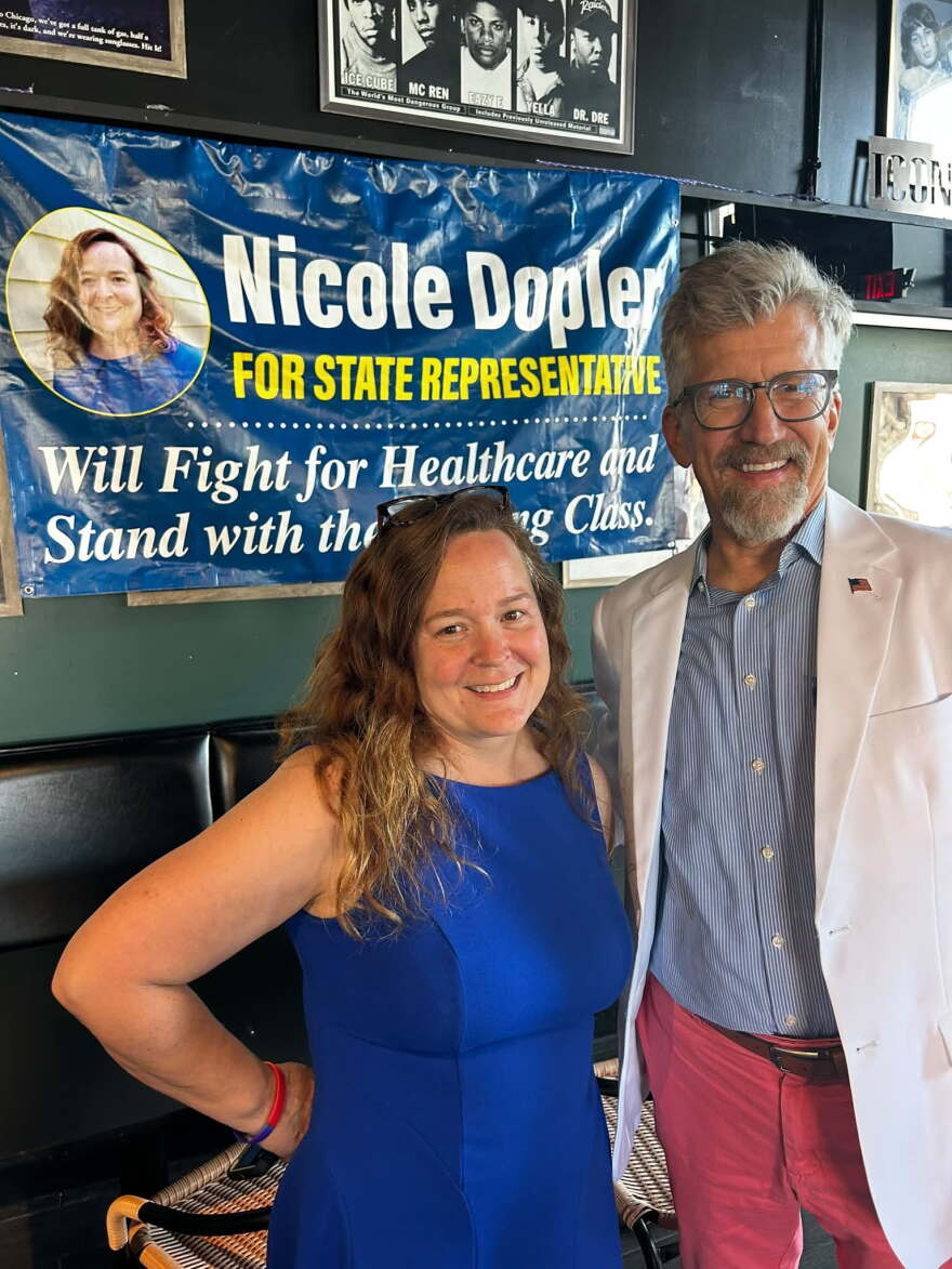 Democrat Nicole Dopler (pictured with Kai Swanson) is running against GOP Illinois State Rep. Ryan Spain (in the 73rd House District).