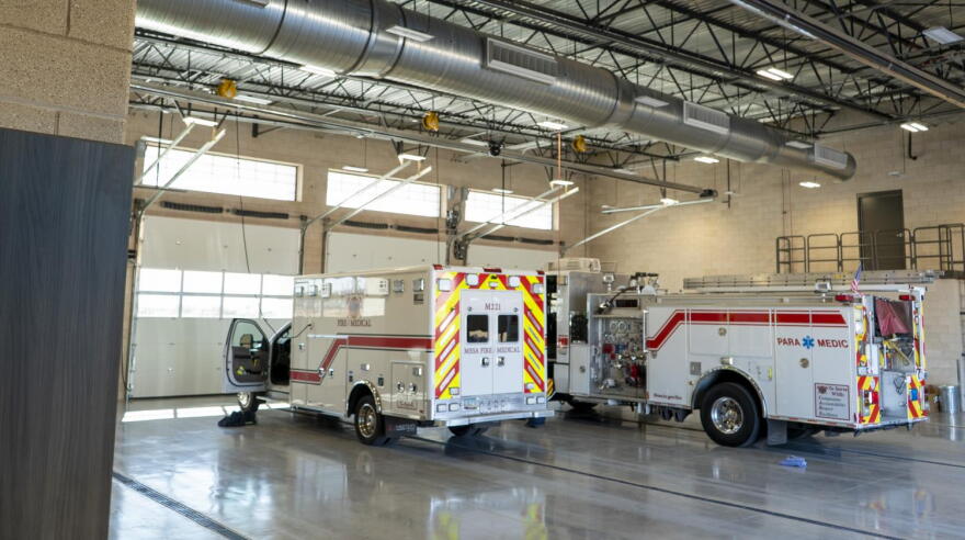 ambulance and fire truck inside station