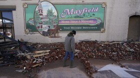 Damage from a tornado is seen in downtown Mayfield, Kentucky.