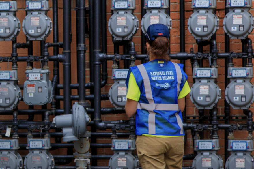 a person reading meters