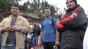 Venezuelan migrant Jose Molleja (center) with other frustrated Venezuelan refugees last week at the mountainous Colombia-Ecuador border crossing of Rumichaca.