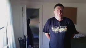 Army veteran Tim Turner, 57, stands in his room at a Hoosier Veterans Assistance Foundation transitional house in Indianapolis.