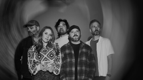 a group of people posing 