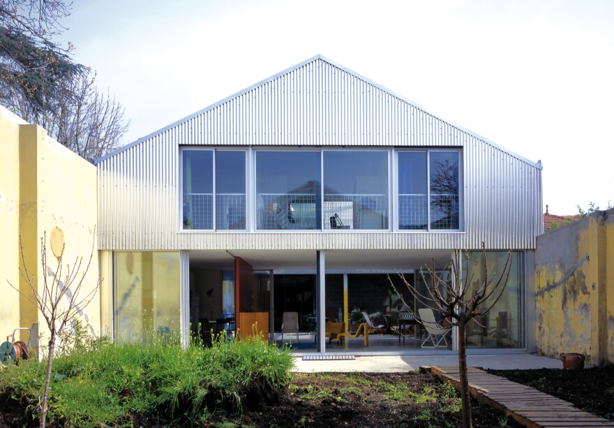 <a href="https://www.lacatonvassal.com/index.php?idp=15">This house in Bordeaux</a> was built in a former biscuit factory in 1999. Part of the roof has been removed to allow natural light into an intramural garden.