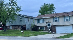 Some of the gutter and roof damage along Hershey Road south of GE Road in Bloomington, seen Saturday morning, April 18, 2026.