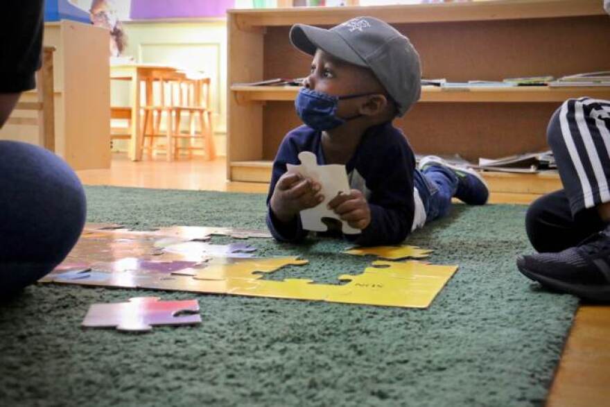 Gabriel Watson, 3, works on a puzzle during his preschool class at Children's Playhouse Whitman in South Philadelphia.