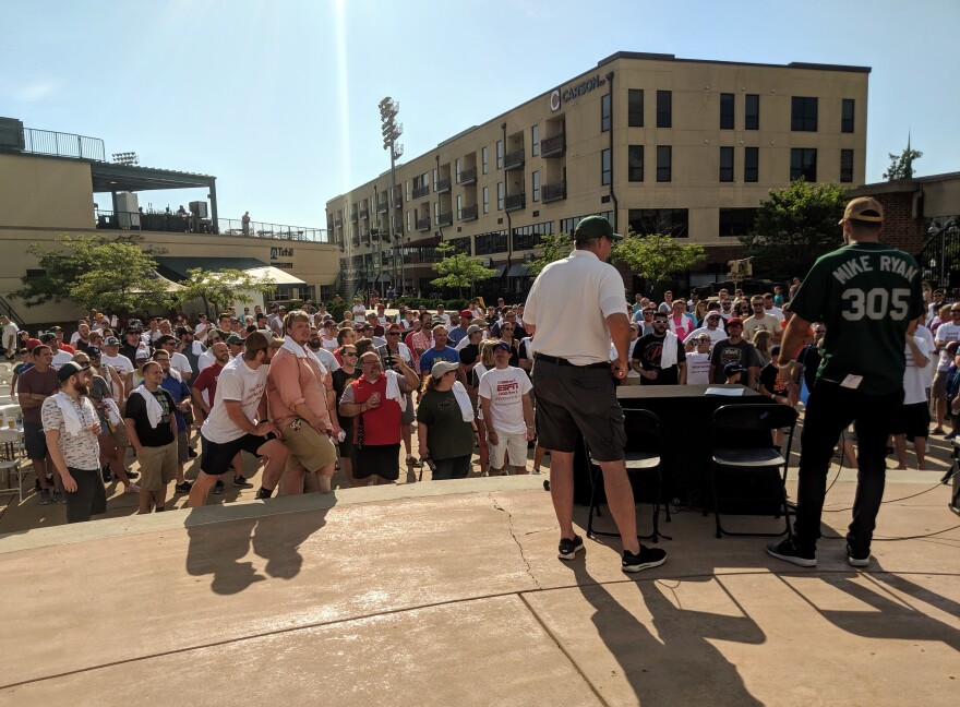 A crowd gathers around Le Batard Show executive producer Mike Ryan during the show's visit to Fort Wayne in 2019.