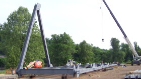Workers assemble the Eggners Ferry replacement span.