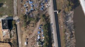 This image from Google Maps shows the encampments along the riverfront. City officials are stepping up efforts to get residents of these encampments into permanent housing.