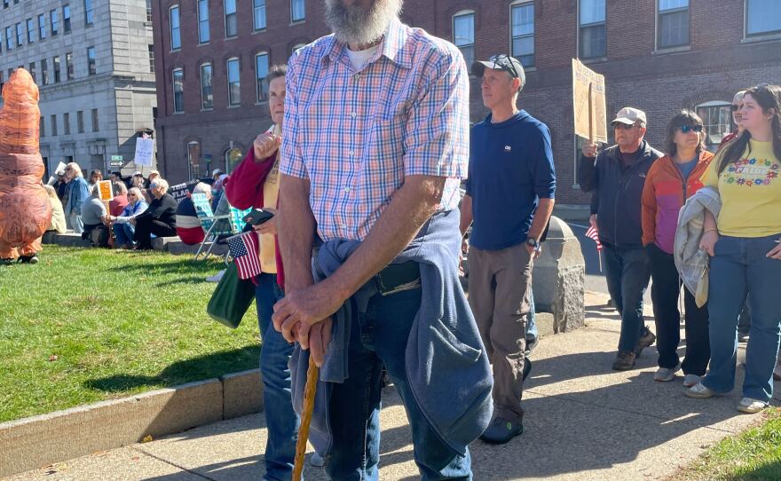 Greg Champlin of Henniker says the last time he attended a demonstration was in 1970 when he protested the war in Vietnam. “This is worse than Vietnam,” Camplin said. “Vietnam only affected a few of us, this affects all of us.”