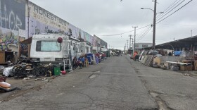 A group of RVs and vehicles in West Oakland. Oakland may soon write groups of vehicle dwellers like this one out of the city's definition of "encampment."