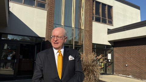 Clifton Park town attorney Kevin Dailey standing in front of town hall