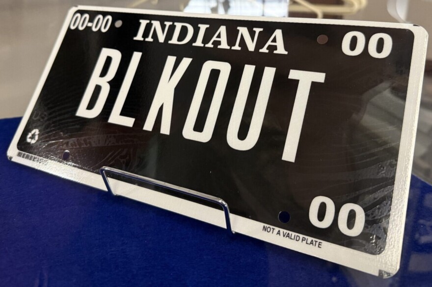 The Indiana Bureau of Motor Vehicles’ new blackout plate, featuring a black background with white characters, will be available to Hoosier drivers starting August 8, 2025.
