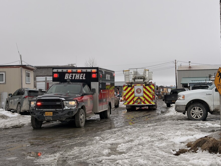 Emergency responders are seen in front of a home in Bethel's Trailer Court neighborhood where two people were found deceased after the home caught fire on April 20, 2026.