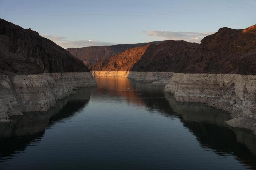 A bathtub ring of light minerals shows the high water line of Lake Mead near Hoover Dam at the Lake Mead National Recreation Area near Boulder City, Nev.