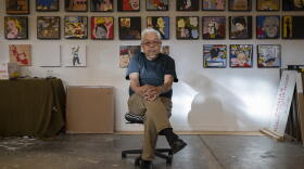 Roger Shimomura pictured with his work, which employs playful-looking imagery to examine dangerous stereotypes. The artist spent part of his childhood in what he calls an incarceration camp.