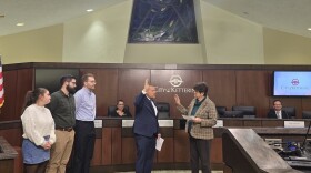 Bryan Suddith being sworn into office by former Kettering Mayor Peggy Lehner