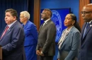 Gov. JB Pritzker, left, speaks at a Sept. 2 news conference to reporters ahead of potential military deployments in Chicago. Pictured behind him, from left to right: Cook County Board President Toni Preckwinkle, Chicago Mayor Brandon Johnson, Lt. Gov. Juliana Stratton and Attorney General Kwame Raoul.