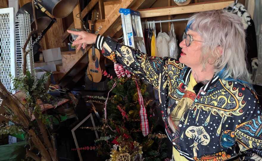 Msesippi shows off some of her Christmas supply, and bag head, collection.