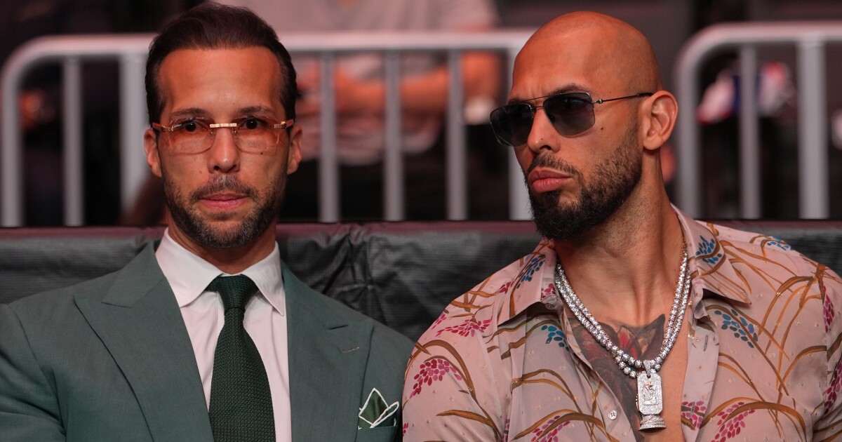 Andrew Tate, right, and his brother Tristan arrive an event, April 11, 2026, in Miami