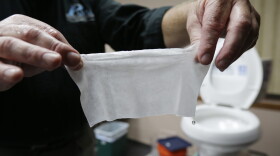 More people are clogging wastewater treatment systems with erroneously labeled "flushable" wipes. (Julio Cortez/AP)