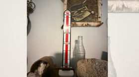 A thermometer measuring the inches of snow in the winter of 1978-79 in Houghton. The read part of the thermometer is near the top and it reads 390.4 inches. 