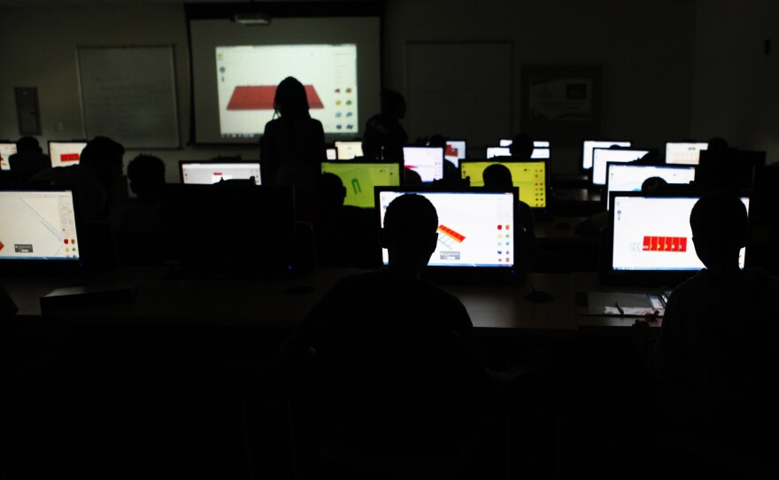 Middle-school boys design apps at Morgan State.