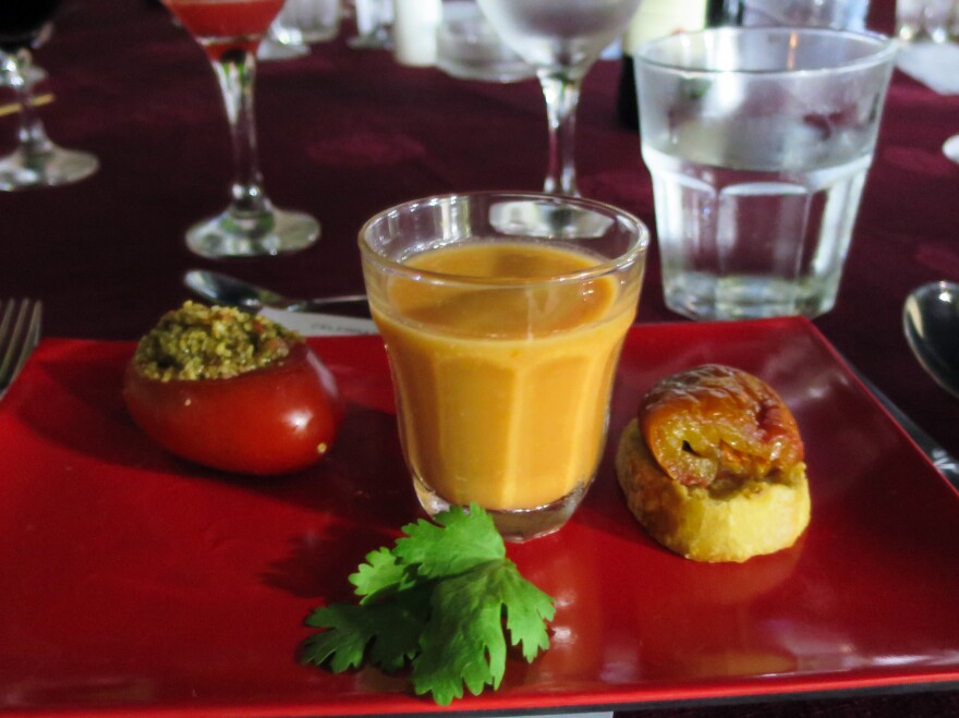 A couscous-stuffed tomato, tomato gazpacho and a piece of bruschetta at a recent Trio Toques event.